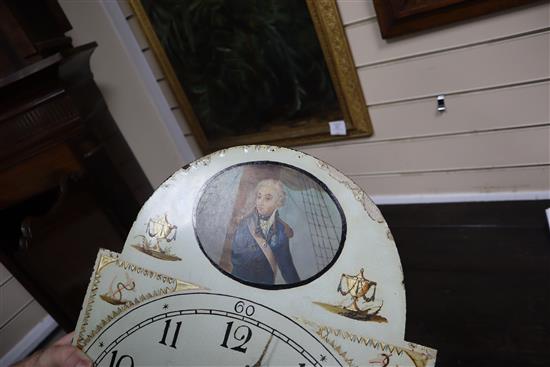 An early 19th century mahogany 8 day striking longcase clock, the arched enamelled dial painted with a portrait of Admiral Lord Nelson